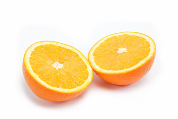 Two halves of one orange on a white background.