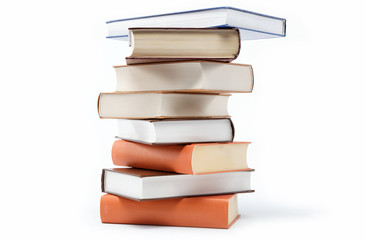 A stack of books on a white background.