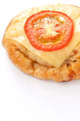 Hamburger with cheese and tomato topping