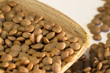 Lentil on a wooden spoon