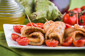 Eggplant roulades with cherry tomato salad.