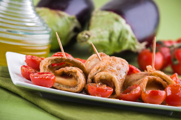 Eggplant roulades with cherry tomato salad.