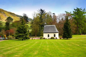 Fotobehang Springtime landscape with an old, white chapel, Scotland © JulietPhotography