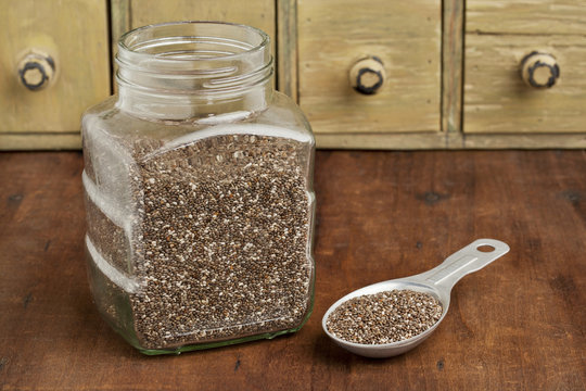 Jar And Tablespoon Of Chia Seeds