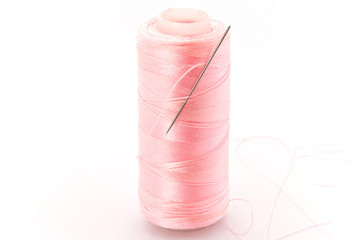 Set of thread and needle.