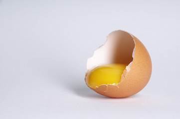Broken egg, white background