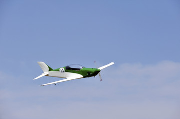 ultralight airplane flying in the sky