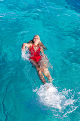 Young  woman swims