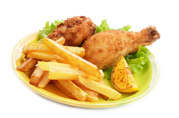 Fried drumsticks with french fries