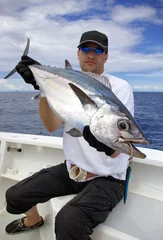 Stof per meter Happy  fisherman holding a tuna fish © sablin