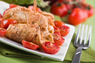 Eggplant roulades with cherry tomato salad.