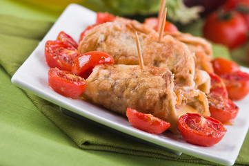 Eggplant roulades with cherry tomato salad.