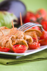 Eggplant roulades with cherry tomato salad.
