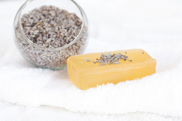 soap and lavender on a white towel