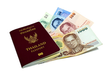 Thailand passport and Thai money on white background.