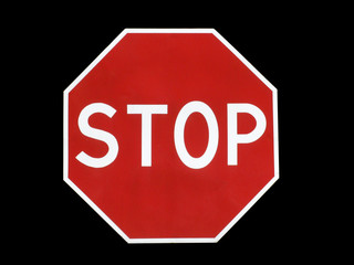 sign STOP over black