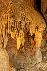 Stalactites and stalagmites forming.