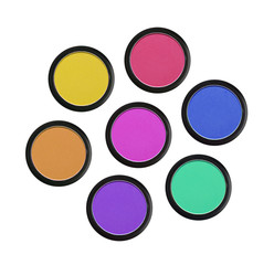 colorful eyeshadows in black boxes isolated on white