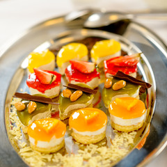 Desserts on silver platter food details