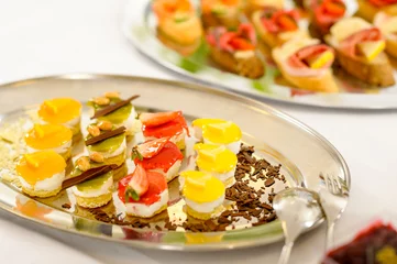  Appetizers mini desserts on catering buffet plate © CandyBox Images