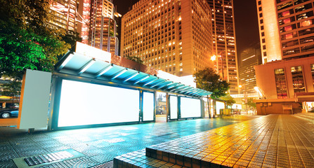 Blank billboard on bus stop at night - 41706820