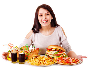 Woman eating fast food.