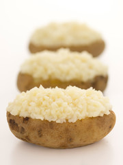 close up of baked potatoes