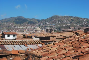 Fotobehang Vista de los tejados de las casas coloniales de Cuzco.. © Trazos sobre Papel