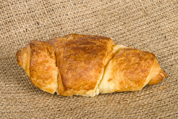 Croissant on burlap