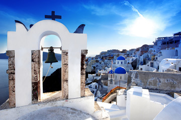 Famous Santorini with church bell in Oia village, Greece