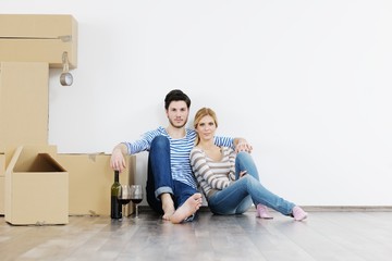 Young couple moving in new house