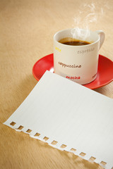 cup coffee and note paper