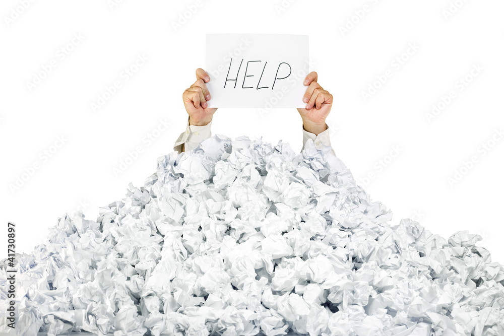 Wall mural person under crumpled pile of papers with a help sign / isolated