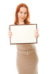Fototapeta premium Happy woman showing blank signboard