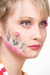 pretty blond woman with face art