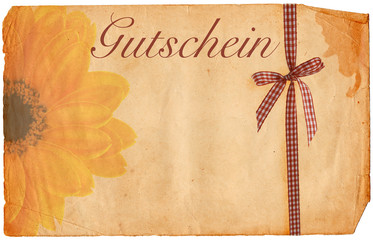 old paper voucher with flower