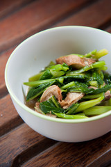 Stir-fried mix colorful vegetables in white round bowl