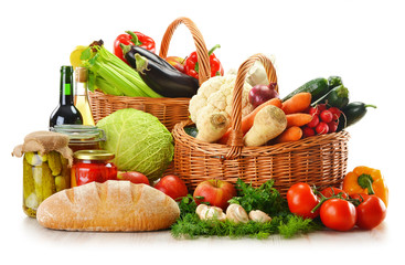 Wicker basket and grocery isolated on white