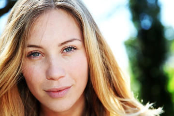 Obraz premium Portrait of beautiful blond smiling woman