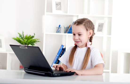 girl working on laptop