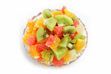 Fresh fruits salad on white background
