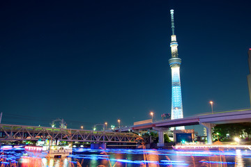 Tokyo skytree blue illumination beside Sumida river