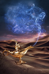 Magic Aladdin's Genie lamp on a desert - obrazy, fototapety, plakaty