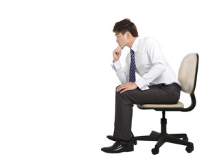 businessman are thinking and sitting on the office chair