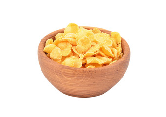 Wooden bowl of cornflakes, isolated on white background