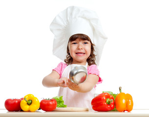 adorable kid girl preparing healthy food