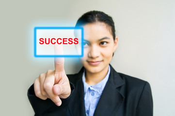 business woman hand pushing success button