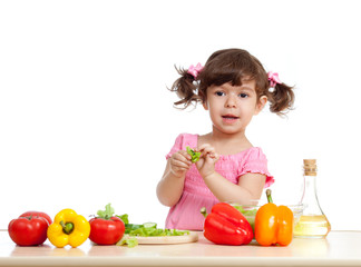 adorable kid girl preparing healthy food