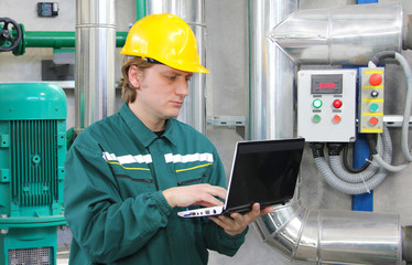 Industrial worker with notebook