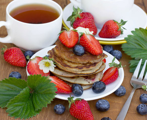 Pancakes with a creamy fresh summer berries